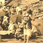 本郷動坂通<br>Scene of destruction in Dōzaka, Hongō<br>Source: Postcard