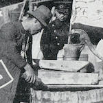 井水消毒班  十一月十五日<br>Disinfecting well water, 15 November 1923<br>Source: 大正大震災誌  警示廳, 1925