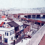 千代田学校屋上より両国橋及び本所方面を望む<br>View of reconstructed neighborhood from the rooftop of Chiyoda Primary School, looking toward Ryōgokubashi Bridge and Honjo<br>Source: Postcard, 1930