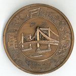 Paperweight issued by the City of Tokyo in March 1930 to mark the completion of the Imperial Capital Reconstruction Project. Sixty thousand paperweights were produced as a commemorative gift from the City of Tokyo for guests who attended the ceremony.<br>Source: Paperweight, 1930